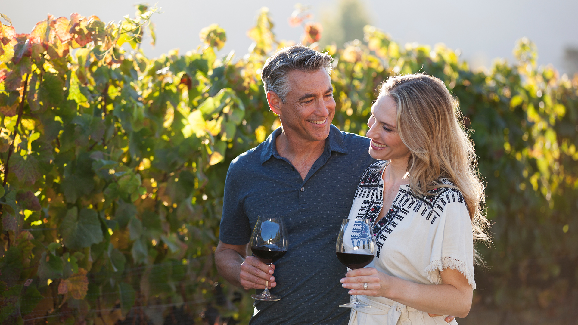 Couple Walking with Wine