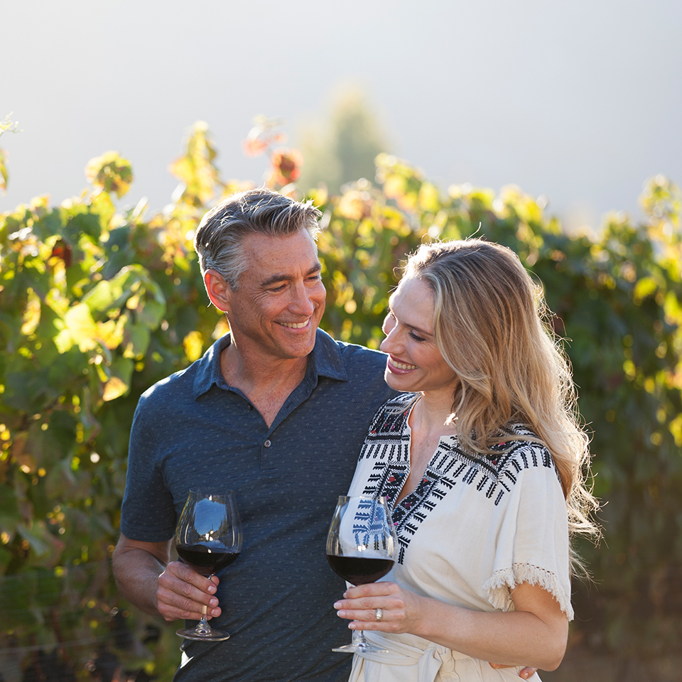 Couple Walking with Wine